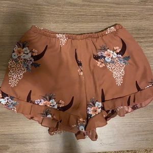 Fun and flowy cow head shorts.